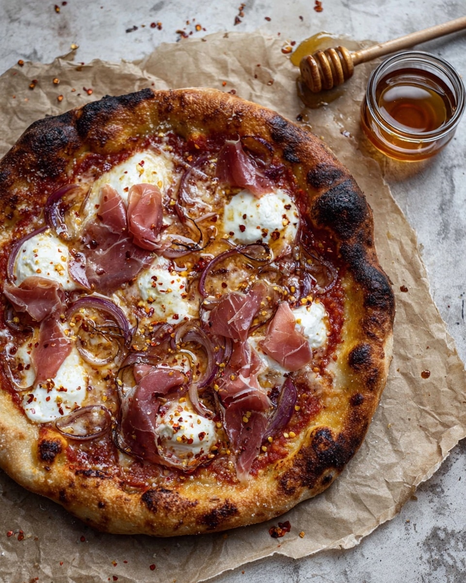 A rustic pizza with a thick, golden-brown crust slightly charred at the edges, topped with a layer of rich red tomato sauce spread evenly across the base. On top, irregular dollops of melted white mozzarella cheese and creamy ricotta cheese create a soft texture. Thin slices of pinkish cured meat are scattered over the cheese, along with thin, translucent rings of purple-red onion. The surface is lightly sprinkled with red chili flakes adding small dark red specks. The pizza sits on crumpled parchment paper on a white marbled surface, next to a small jar of chili oil and a honey dipper with honey and chili flakes dripping off it. Photo taken with an iphone --ar 4:5 --v 7